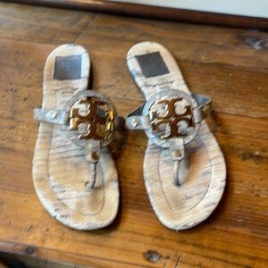 Tory Birch flip flops. Very comfortable! Looks great with everything!
